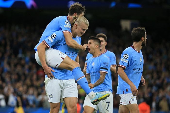 Para pemain Manchester City merayakan gol Erling Haaland ke gawang Borussia Dortmund dalam laga kedua Grup G Liga Champions di Stadion Etihad, Rabu (14/9/2022).