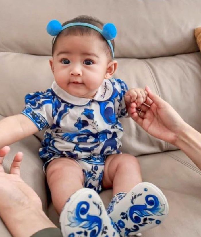 Moana dengan aksesori khasnya