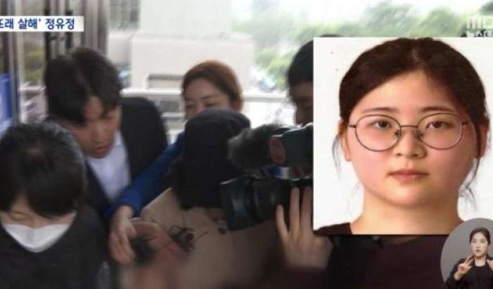 Jeong Yoo Jung digiring petugas setempat usai ditangkap karena melakukan pembunuhan dan mutilasi.