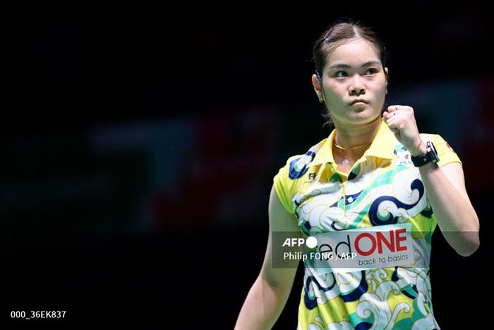 Tunggal putri Thailand, Busanan Ongbamrungphan, bereaksi saat bertanding melawan Wang Zhi Yi dari China dalam pertandingan babak 16 besar Japan Open 2024 di Yokohama Arena, Yokohama, Kanagawa, Jepang, 22 Agustus 2024. 