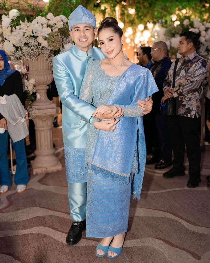 Raffi Ahmad dan Nagita Slavina di pesta pernikahan dua politikus, Zumi Zola dan Putri Zulhas.