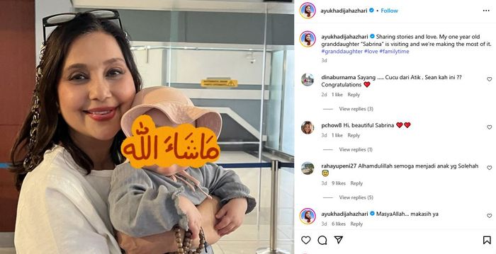 Ayu Azhari menggendong cucunya