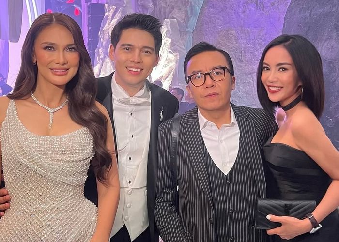 Pasangan Ari Lasso dan Dearly Joshua di resepsi pernikahan Luna Maya dan Maxime Bouttier.