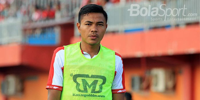 Gelandang Madura United, Asep Berlian.