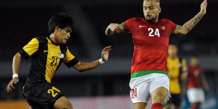 Diego Michiels tampil membela timnas Indonesia di SEA Games 2013 kontra Malaysia.