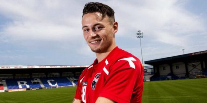   Marc Klok, ketika masih bermain untuk Ross County.  