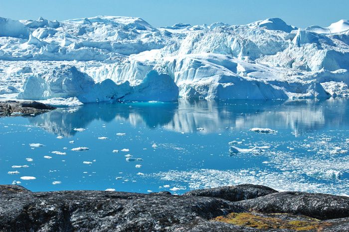 Bongkahan es mencair di Ilulissat Icefjord, Greeland.