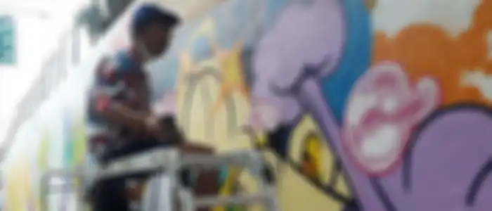 Muchlis Fachri (Muklay). Salah satu Seniman yang terlibat dalam #RepaintIndonesia.