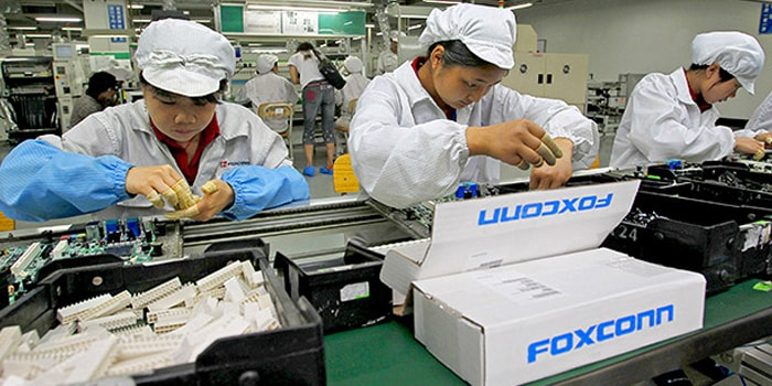 Ilustrasi para pekerja pabrik salah satu supplier Apple, Foxconn