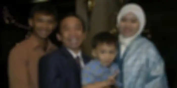Qomar dan keluarga