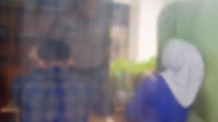 Pasangan selingkuh saat berada di Polsek Medan Labuhan, Rabu (4/9/2019) 
