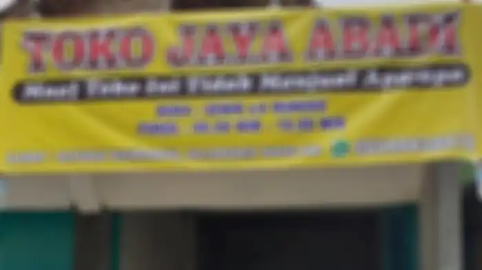 Spanduk Toko Jaya Abadi