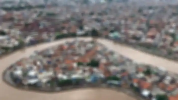 Tampilan banjir Jakarta di kawasan Kampung Melayu, Jakarta Timur, dari helikopter yang mengangkut Kepala BNPB Doni Monardo dan Gubernur DKI Jakarta Anies Baswedan, saat mereka meninjau kondisi banjir terkini pada Rabu (1/1/2020)
