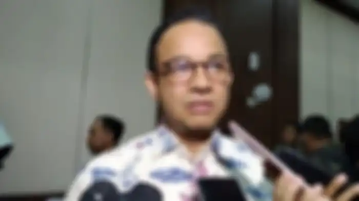Anies Baswedan, usai mengikuti rapat soal persiapan pemindahan ibu kota baru di Kantor Bappenas, Jumat (15/11/2019). 