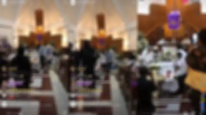 Mutia Ayu gendong Gewa di samping jenazah Glenn Fredly