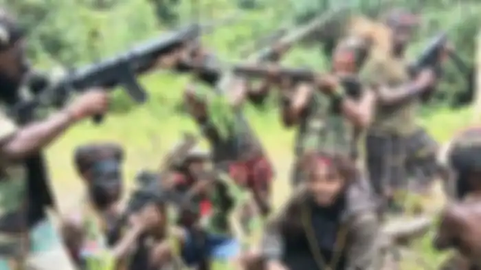 Ilustrasi KKB Papua. KKB Papua yang Berfoto dengan Jasad Korbannya Ternyata Adalah Anggota KNPB. 