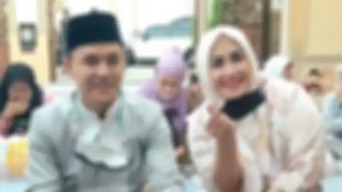 Melinda dengan sang suami