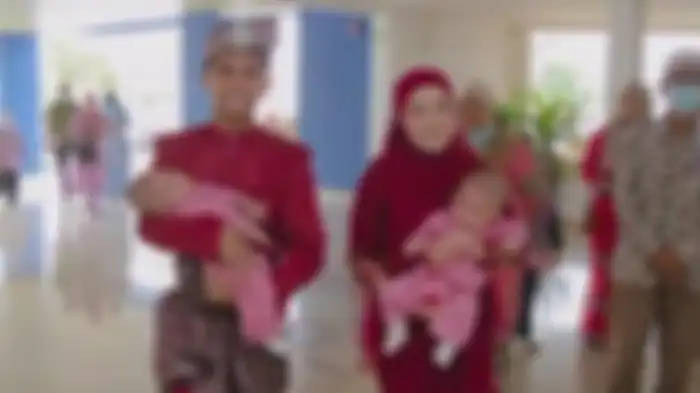 Pengantin bawa bayi kembar saat gelar resepsi pernikahan