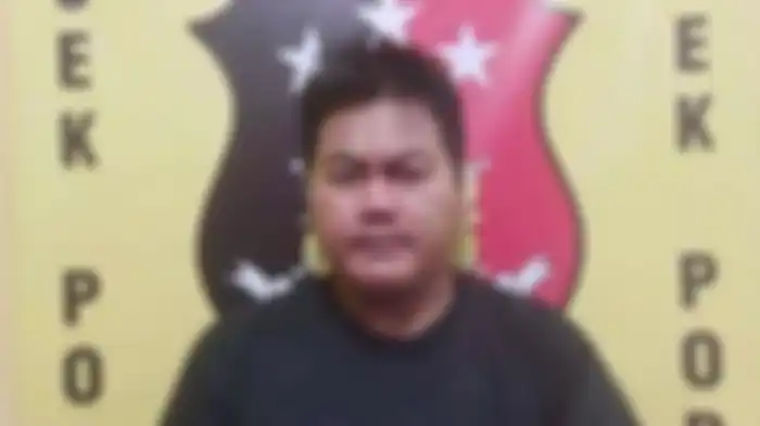 Dicky Setiawan, tersangka penganiaya anak tirinya yang masih berusia tiga tahun hingga meninggal dunia. 