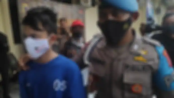 Tersangka DRS saat berada di Polres Bantul