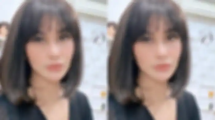 Bebizie tampil dengan rambut pendek poni depan.