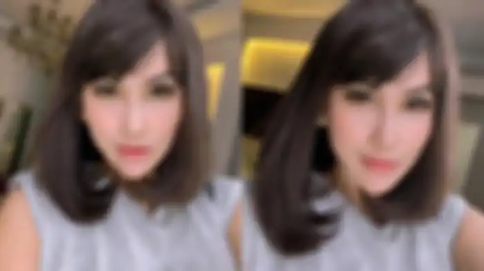 Bebizie tampil dengan rambut pendek poni samping.