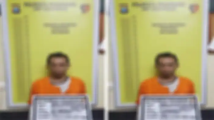 Tersangka DS (39) alias Idep saat diamankan polisi. DS diketahui dibantu dengan istrinya merudapaksa anak di bawah umur. 