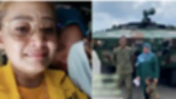 Seorang ibu hamil ngidam ingin naik tank milik tentara.