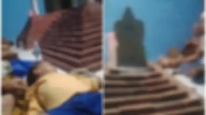 Tangkapan gambar kegiatan warga didiuga aliran sesat dengan memuja kuburan palsu di dalam rumah Abah Aliyudin di Kampung Cibuluh, Desa Cibugel, Kecamatan Cisoka, Kabupaten Tangerang. 