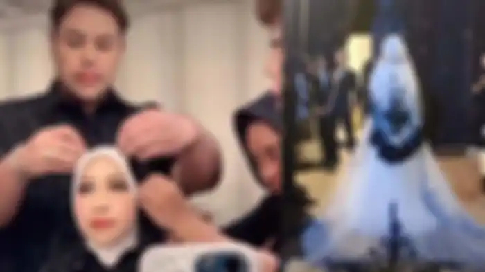 Adiba Khanza tampak cantik dengan busana bewarna hitam putih di acara resepsi pernikahannya dengan Egy Maulana Vikri, Minggu (10/12/2023). Ada sentuhan tangan Ivan Gunawan di balik penampilannya. 
