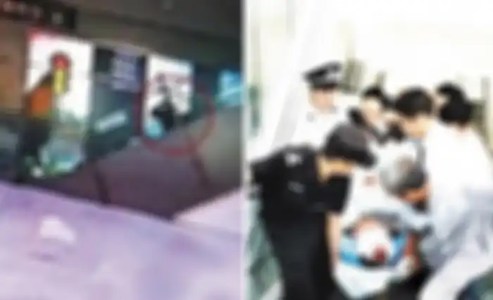 Petugas memberikan bantuan kepada pria yang baru saja jatuh dari eskalator, Chen.