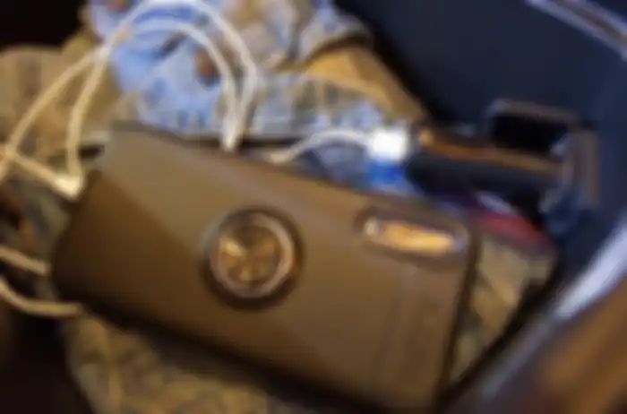 Charger Honda Genio ada di bagasi