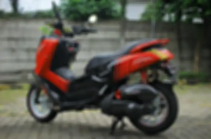 Yamaha NMAX dengan livery Advan Lancer Evo IX Fumio Nutahara