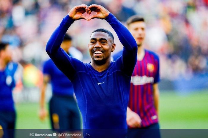 Ekspresi penyerang Barcelona, Malcom, usai membawa timnya mengalahkan Espanyol dalam laga Liga Spanyol di Stadion Camp Nou, Sabtu (30/3/2019).