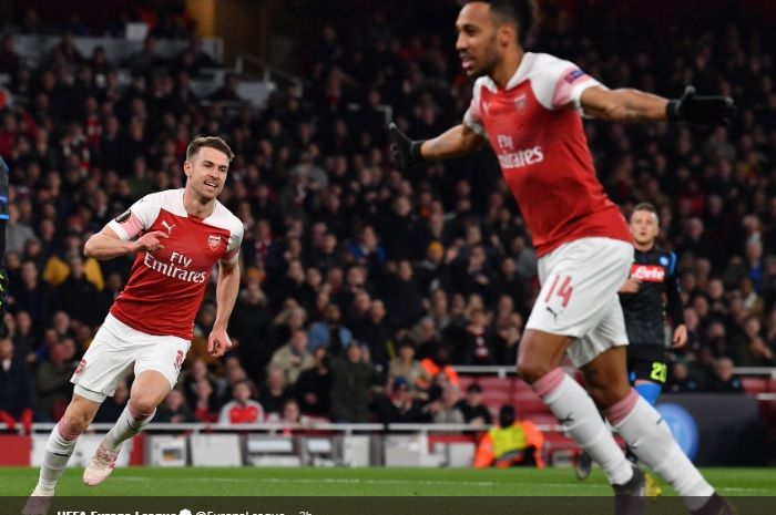 Selebrasi Aaron Ramsey usai menjebol gawang Napoli pada leg pertama perempat final Liga Europa