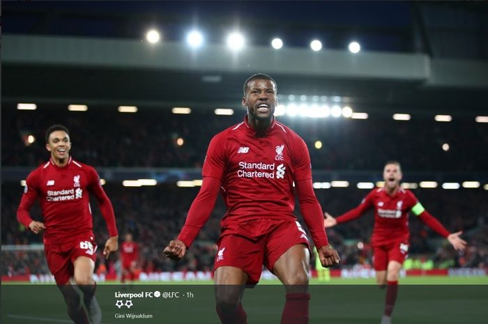 Bek Liverpool, Trent Alexander-Arnold (kiri), melakukan selebrasi bersama Georginio Wijnaldum dalam semifinal leg kedua Liga Champions kontra Barcelona, Selasa (7/5/2019)