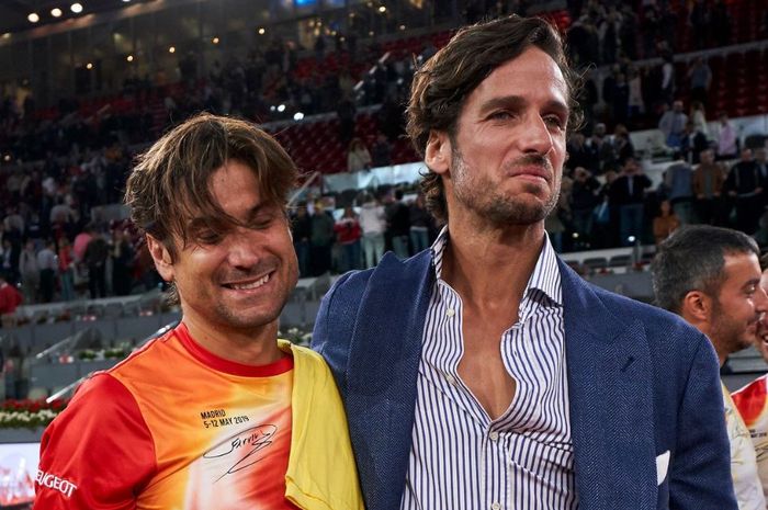 Petenis asal Spanyol, David Ferrer (kiri) saat mengumumkan pensiun usai kalah dari Alexander Zverev pada babak kedua turmanen Madrid Open 2019, Rabu (8/5/2019)