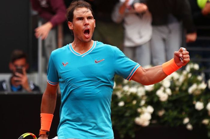 Petenis asal Spanyol, Rafael Nadal saat bertanding pada final Rome Masters 2019, Minggu (19/5/2019)