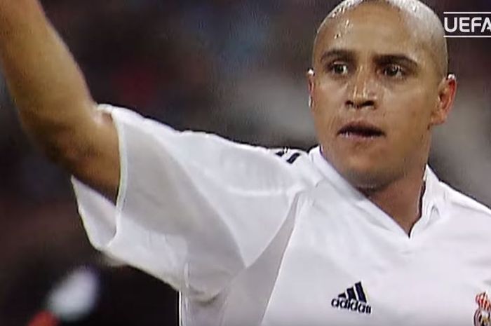 Ekspresi Roberto Carlos ketika membela klub besar Spanyol, Real Madrid.