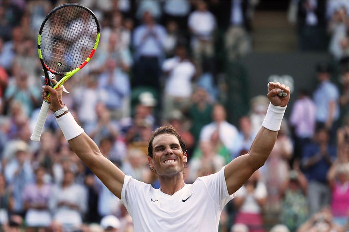 Ekspresi Rafael Nadal usai menjalani pertandingan perempat final Wimbledon 2019 di Center Court, Wimbledon, Inggris, Rabu (10/7/2019).