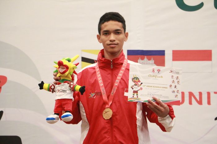 Selebrasi Atlet pencak silat Indonesia pada ASG 2019, M. Zaki Zikirillah meraih medali emas, Senin (22/7/2019)