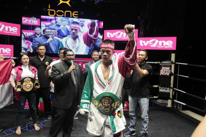 Petinju nomor satu Indonesia, Daud Yordan, usai memenangi pertarungan  WBC International Challenge kelas ringan super di Pattaya, Thailand, Minggu (4/8/2019).