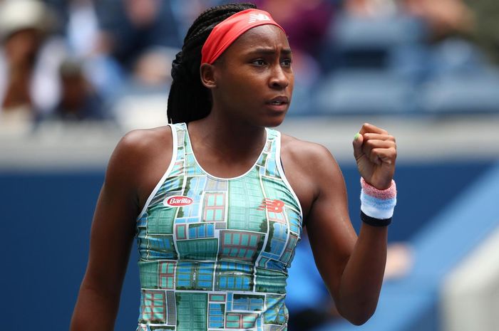 Petenis putri Amerika Serikat (AS), Coco Gauff, melakukan selebrasi seusai memenangi poin pada pertandingan babak kesatu US Open 2019 di Flushing Meadows, New York, Amerika Serikat.