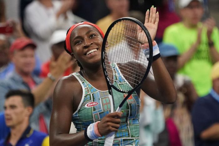 Petenis putri Amerika Serikat (AS), Coco Gauff, melakukan selebrasi seusai memenangi pertandingan babak kesatu US Open 2019 di Flushing Meadows, New York, Amerika Serikat.