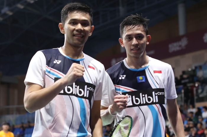 Pasangan ganda putra Indonesia, Fajar Alfian/Muhammad Rian Ardianto, berpose setelah memastikan diri ke semifinal Korea Open 2019 di Incheon Airport Skydome, Jumat (27/9/2019).