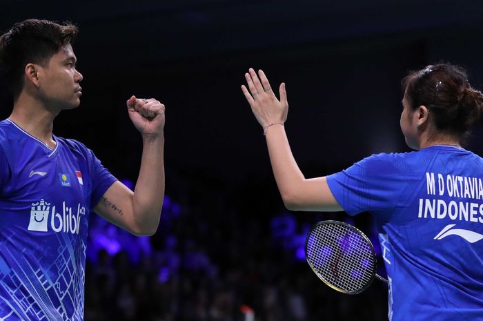 Pasangan ganda campuran Indonesia, Praveen Jordan/Melati Daeva Oktavianti, bereaksi pada perempat final Denmark Open 2019 di Odense Sportspark, Jumat (18/10/2019).