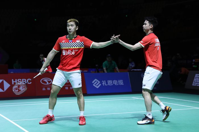 Pasangan ganda putra Indonesia, Marcus Fernaldi Gideon/Kevin Sanjaya Sukamuljo, pada babak perempat final Fuzhou China Open 2019 di Haixia Olympic Sports Center, Jumat (8/11/2019).