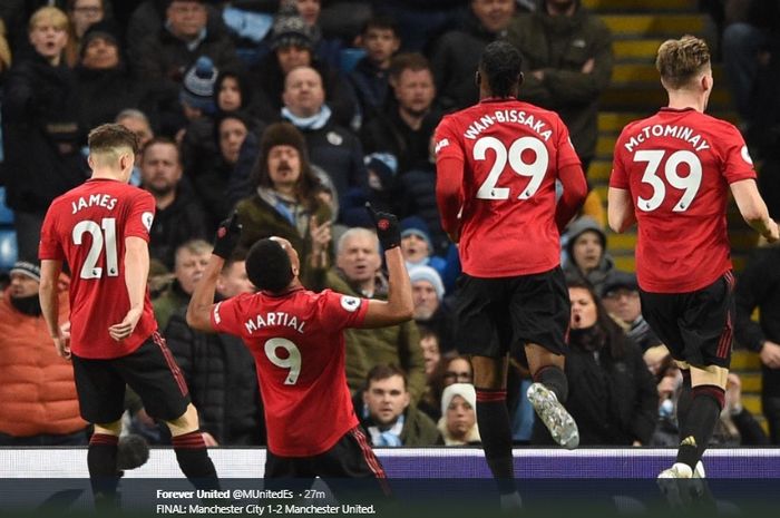 Selebrasi Anthony Martial usai mencetak gol kedua Manchester United ke gawang Manchester City dalam lanjutan pertandingan pekan ke-16 Liga Inggris, Sabtu (7/12/2019).