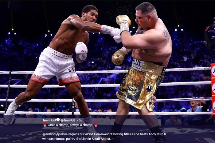 Aksi Anthony Joshua saat memukul Andy Ruiz Jr dalam pertandingan ulang untuk perebutan gelar kelas berat di Diriyah Arena, Ad Diriyah, Arab Saudi, Minggu (8/12/2019).