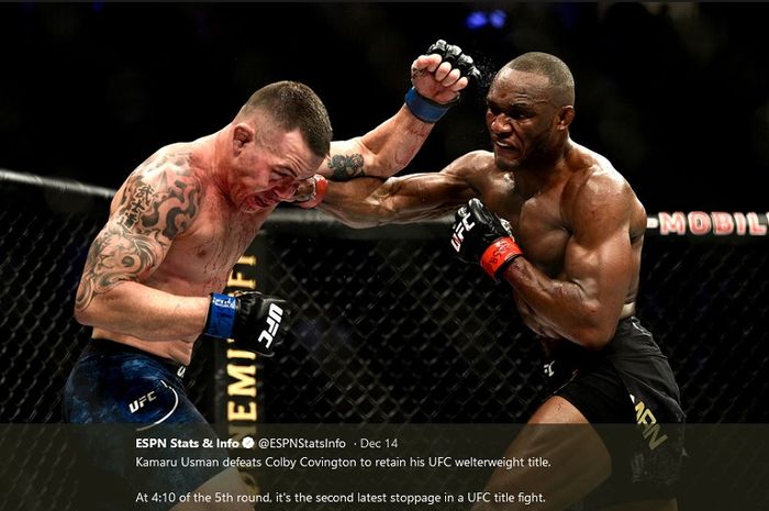 Colvy Covington (kiri) dan Kamaru Usman (kanan) dalam pertarungan UFC 245, Minggu (15/12/2019). Dalam laga tersebut, Usman dinyatakan menang melalui TKO dalam empat ronde. 